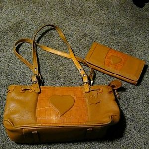 Leather caramel brown handbag and wallet by M.C.
